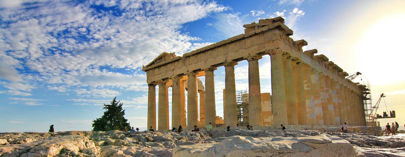 Young Asian Girl In Business Suit Holding Calculator And Working On Laptop