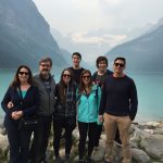 Aldo Cundari With Family With Big Mountains And Lake In The Background