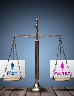 Perfectly Balanced Scale With Paper Sign Showing Men Symbol On One Side And Women On the Other