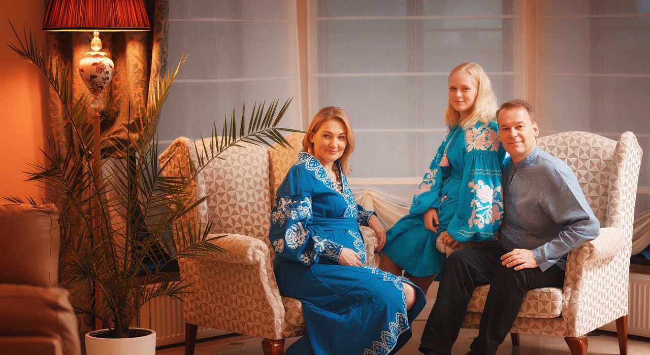 Myron Wasylyk Sitting On Sofa With His Family