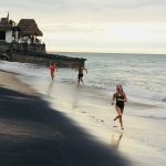 Mikhail Pimenov Running On Beach With His 2 Daughters Behind Him