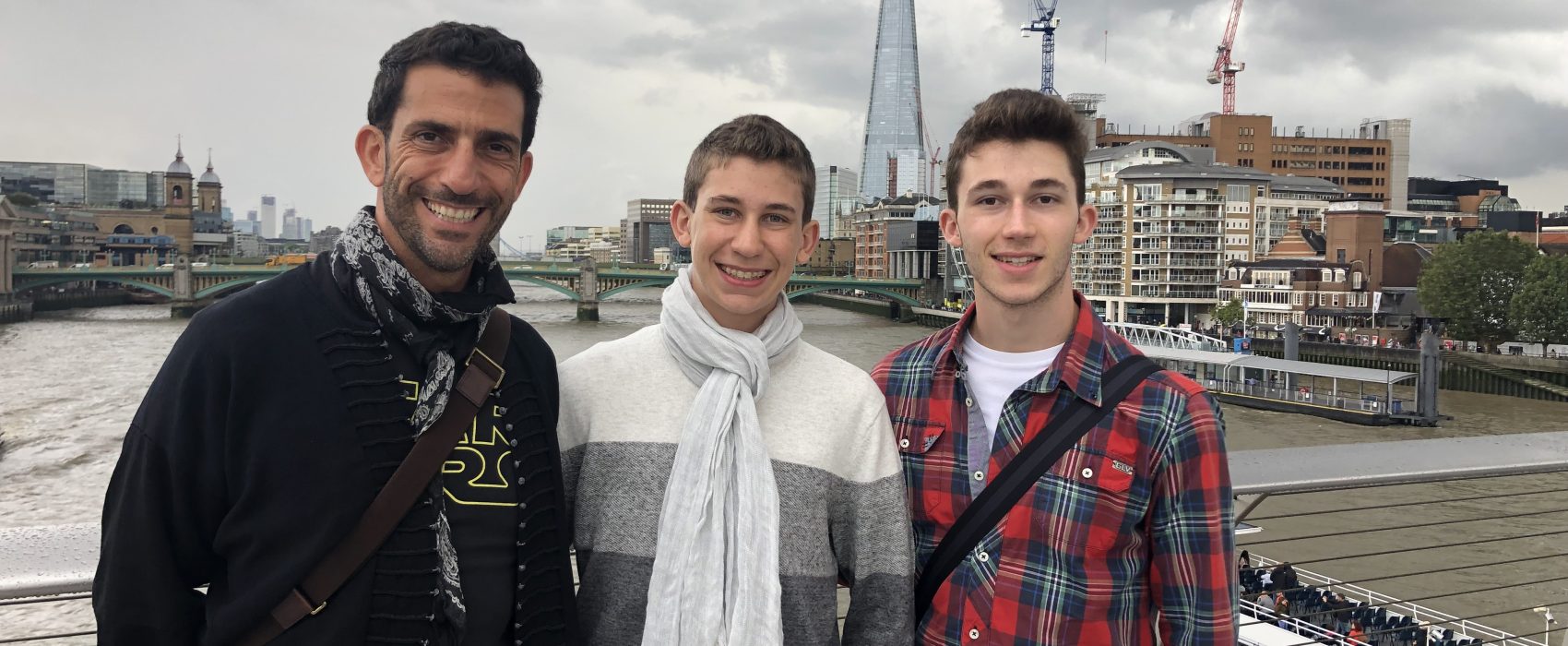 Ziad Awad CEO Of AWAD CAPITAL Smiling With His Sons With London In Background