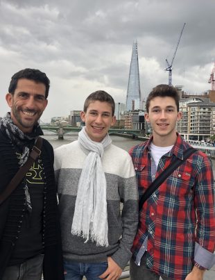 Ziad Awad CEO Of AWAD CAPITAL Smiling With His Sons With London In Background