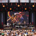 Jazz Concert With Audience Looking At Performer On Stage