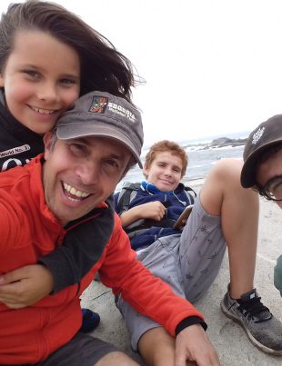 Joao Perre Viana On Beach Smiling With His Children