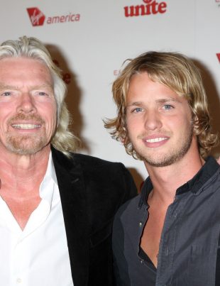 Richard Branson Smiling For Photo With Arm Around His Son Photo: iStock