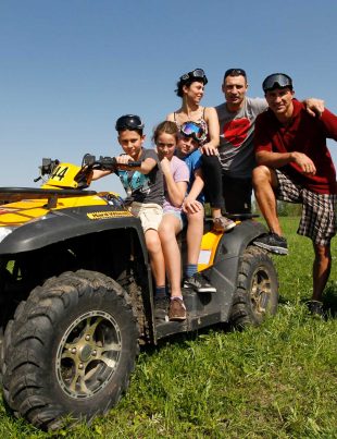 Vitali Klitschko With Family And Brother Wladimir Klitchko Sitting On ATV