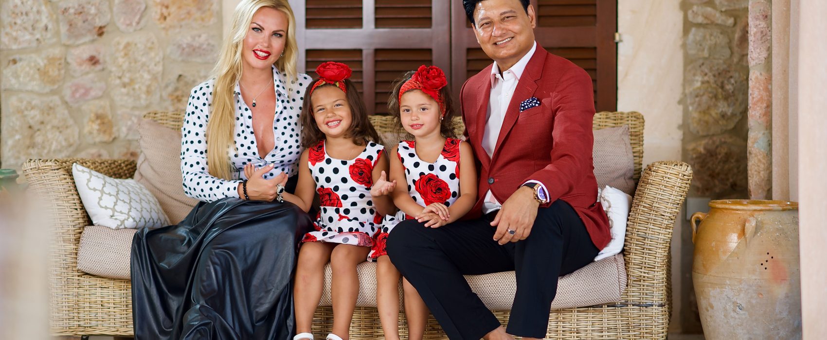 Mohammad Zahoor Sitting On Sofa With Wife Kamaliya And Their Twin Daughters
