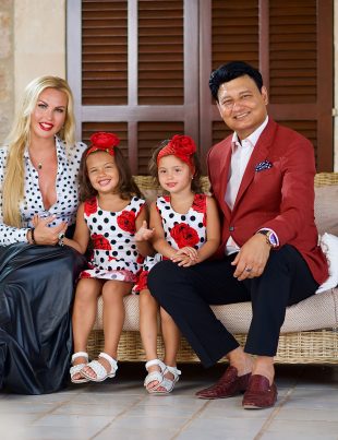 Mohammad Zahoor Sitting On Sofa With Wife Kamaliya And Their Twin Daughters